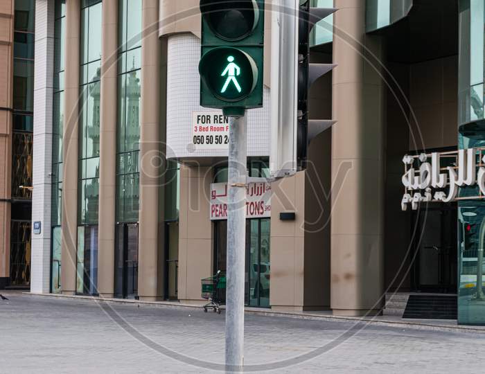 A View Of Traffic Light Which Shows Pedestrian Sign In Abu Dhabi