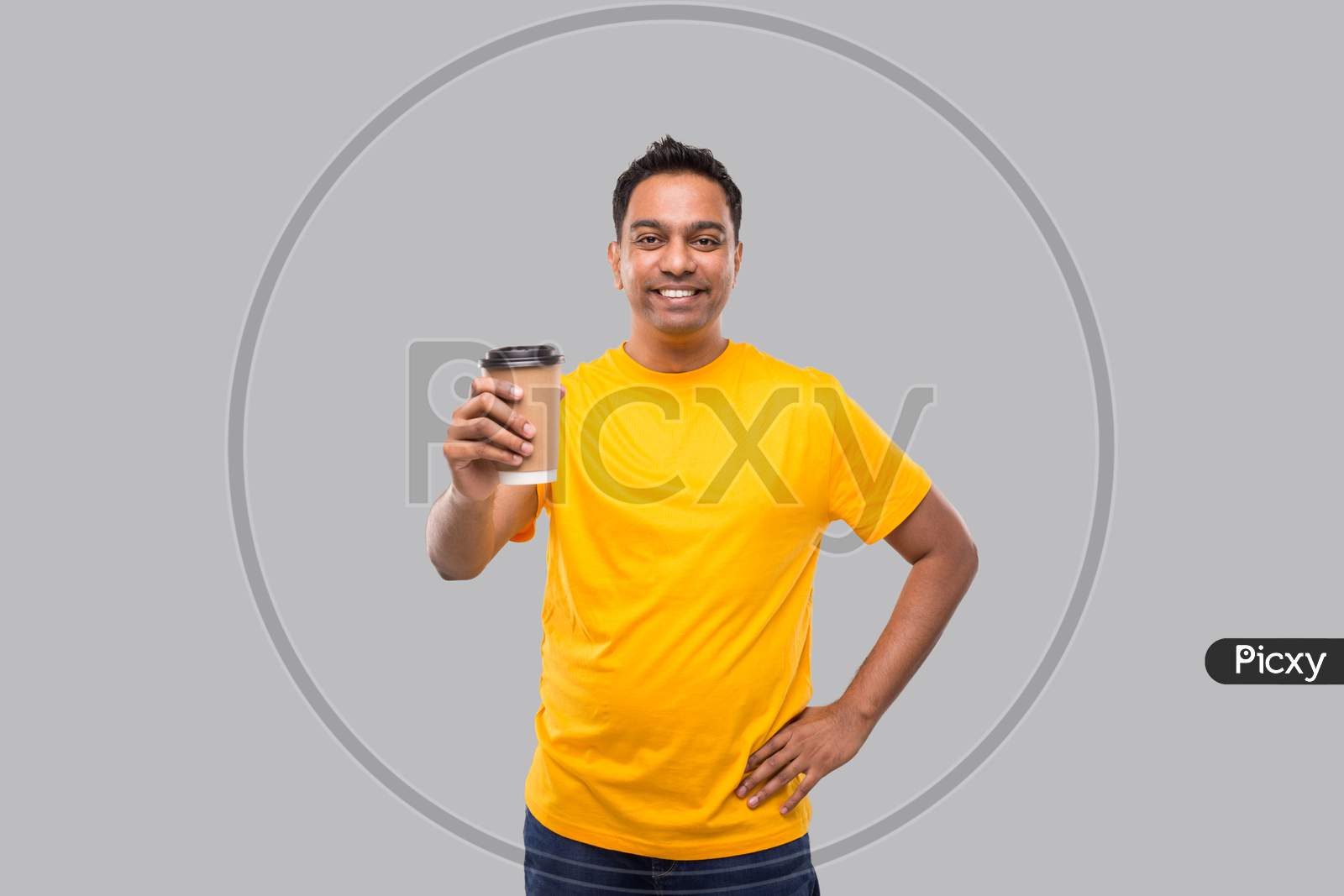 Indian Man Holding Coffee To Go Cup Isolated. Man Coffee Take Away Cup In Hands