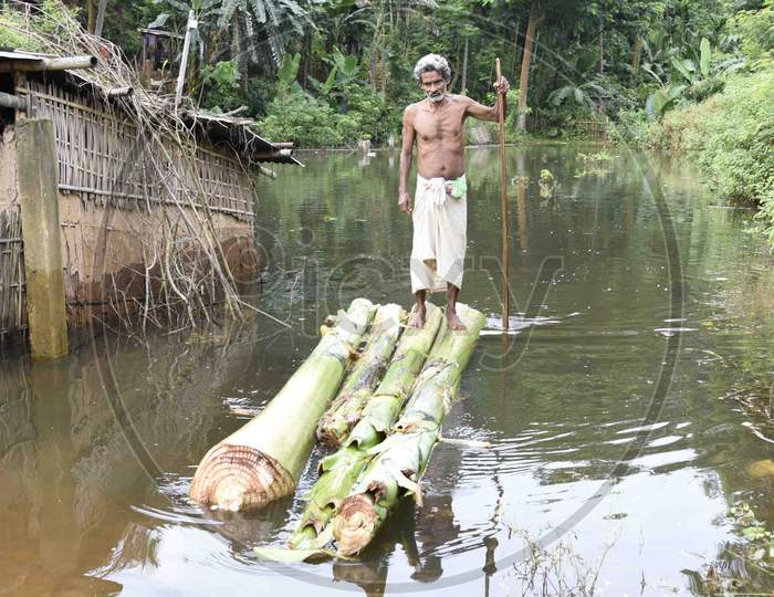 A man cross a flooded area