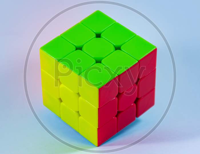 Rubiks Cube image on a white background. A Puzzle solving game with a unique technique or formula