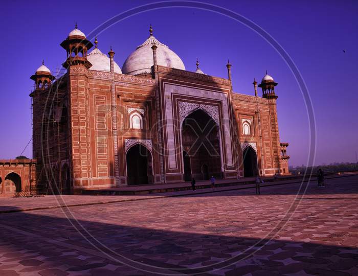 Agra, India - April 10,2014: Entrance Gate Made Of Red Stone Brick Of Tajmahal And It'S Shadow On It In Daytime