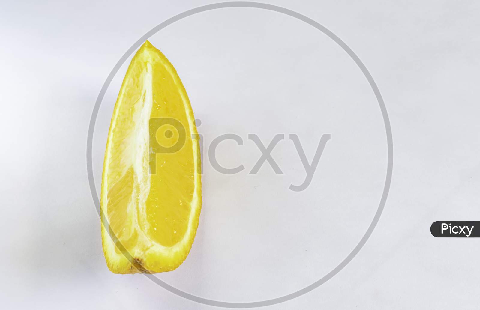 A Sliced Orange On A White Background, Selective Focus, Selective Focus On Subject,