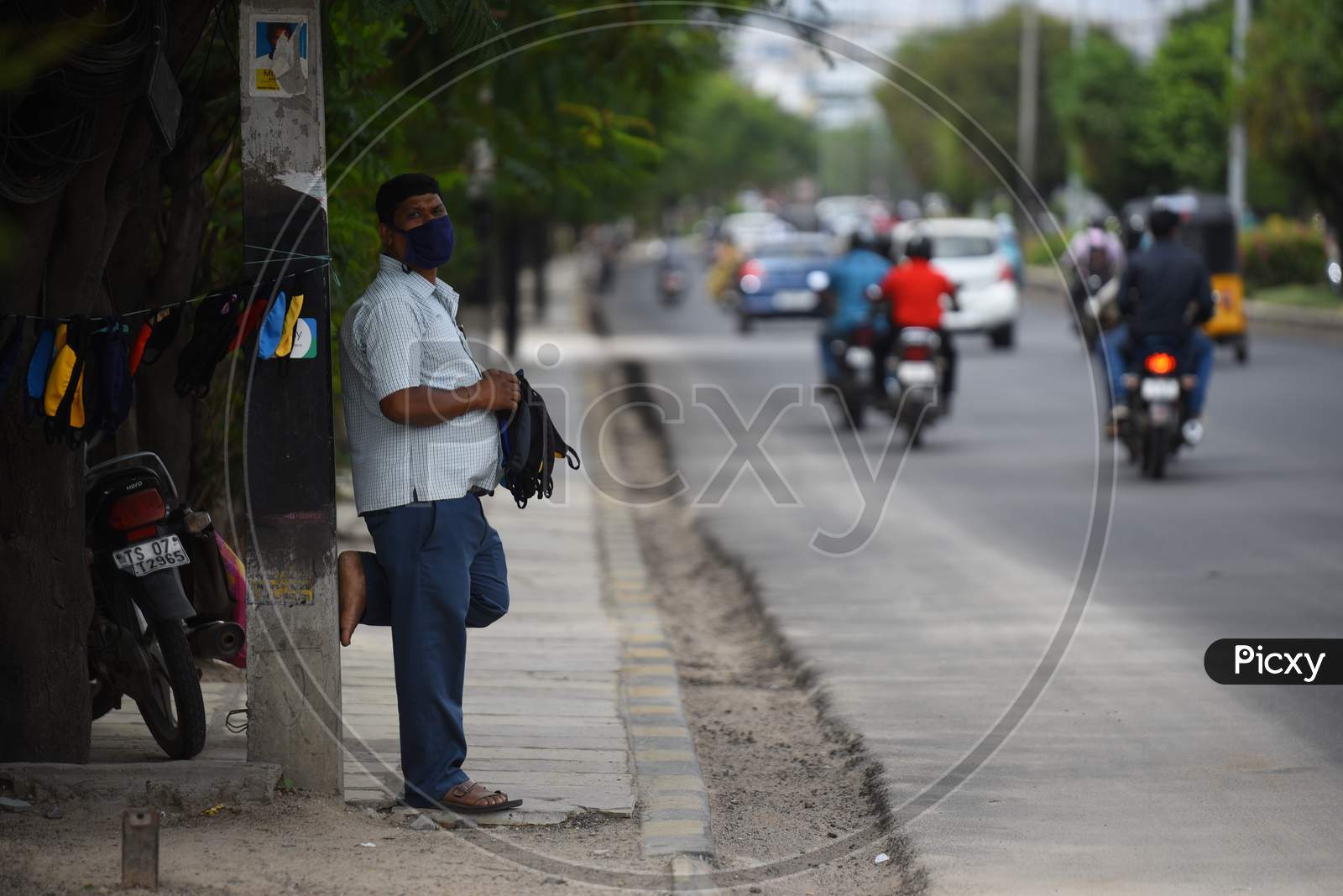 A man sells handmade face masks in Hyderabad on June 8,2020.