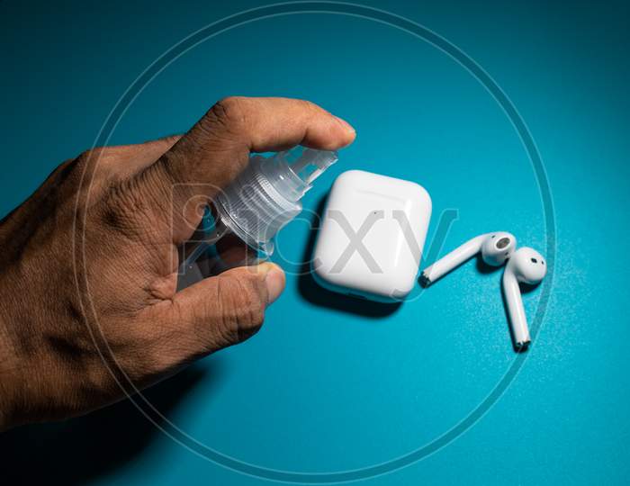 Cleaning Airpods With Sanitizer To Prevent From Corona Virus, Covid 19