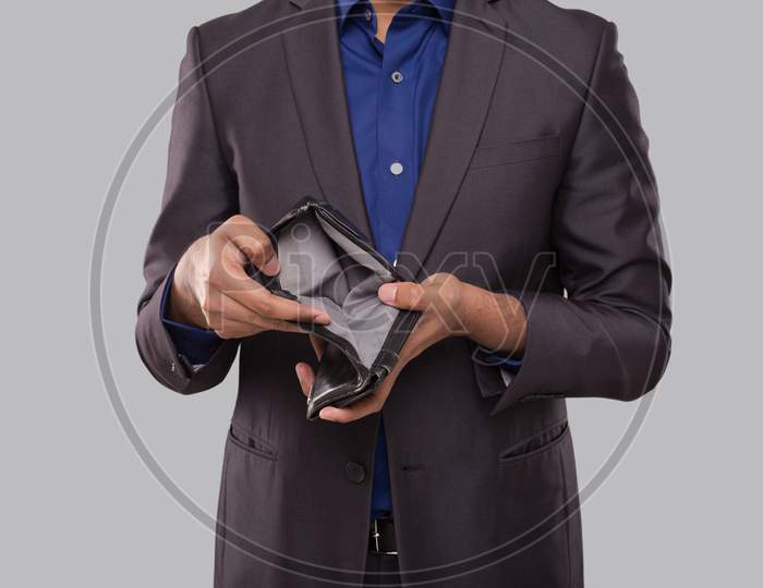 Businessman Holding Empty Wallet Close Up. Indian Business Man No Money, No Salary, No Cash Concept