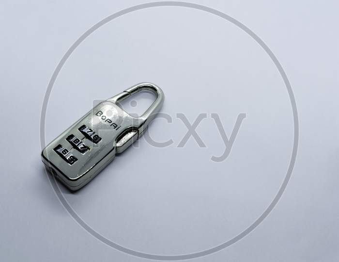 A Lock On A Plain White Background. Selective Focus, Selective Focus On Subject,