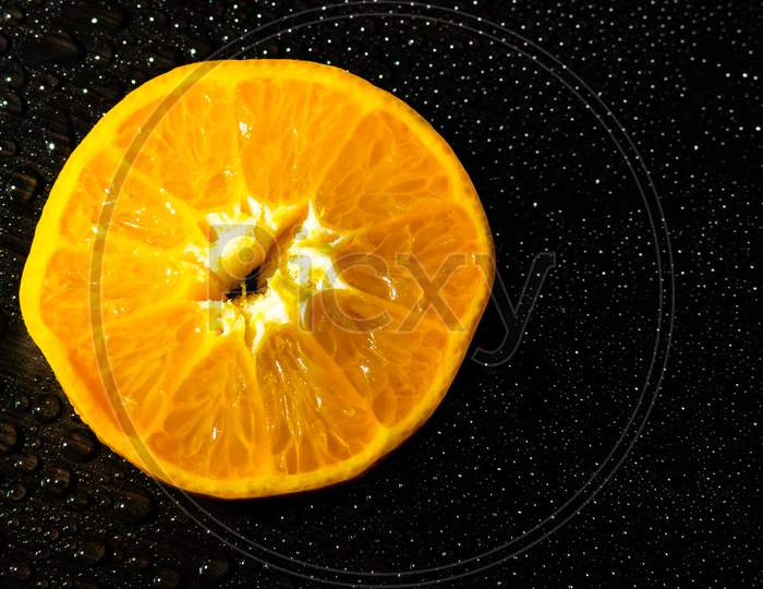 A Beautiful Close Up View Of Wet Orange Slices With Beautiful Background, Vitamin C, Covid 19