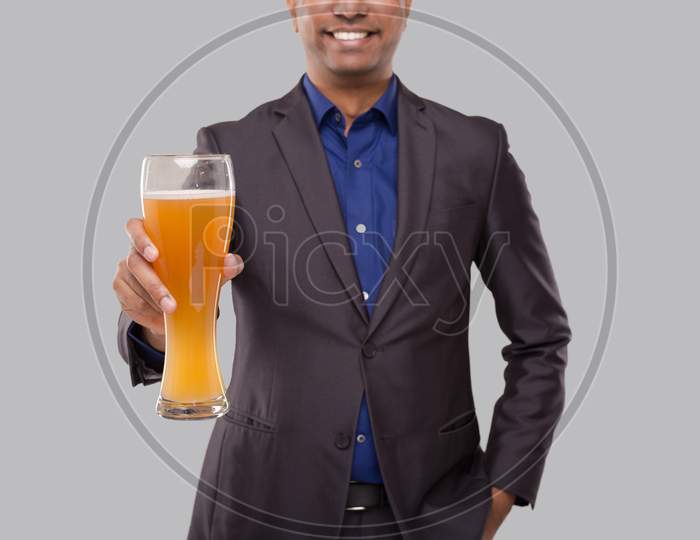 Businessman Showing Beer Glass. Indian Business Man With Beer In Hand Close Up