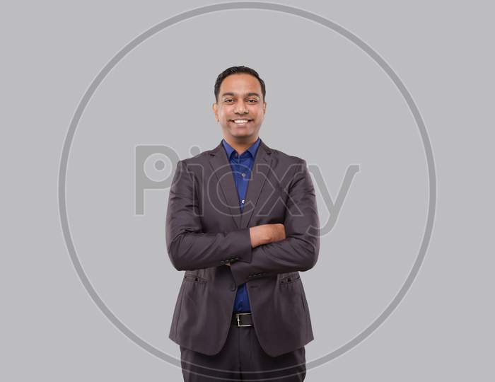 Businessman Smilling Hands Crossed Isolated. Indian Business Man Standing