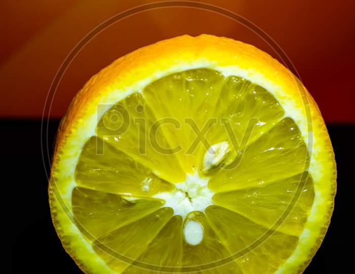 A Beautiful Close Up View Of An Orange Slice With Beautiful Background, Vitamin C, Covid 19