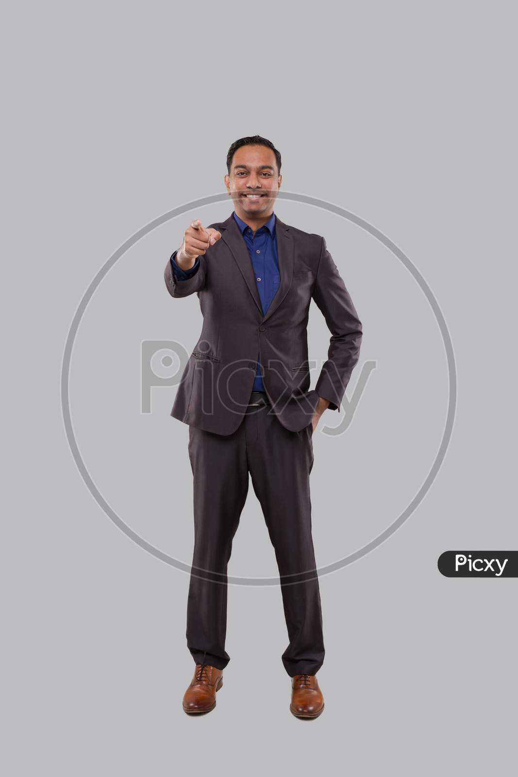 Businessman Pointing Front Watching In Camera Isolated. Indian Man Standing Full Lenght