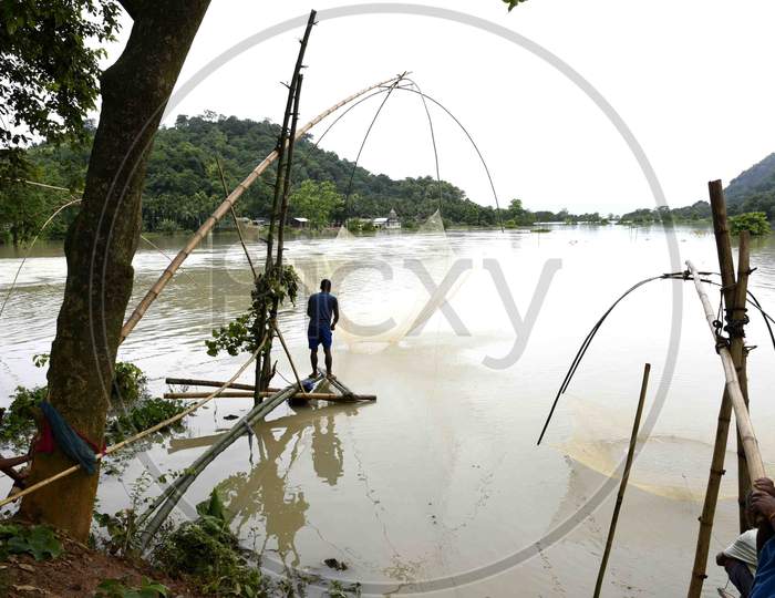Villagers indulge in fishing