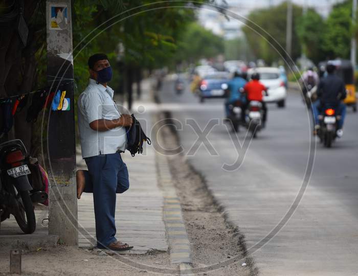 A man sells handmade face masks in Hyderabad on June 8,2020.