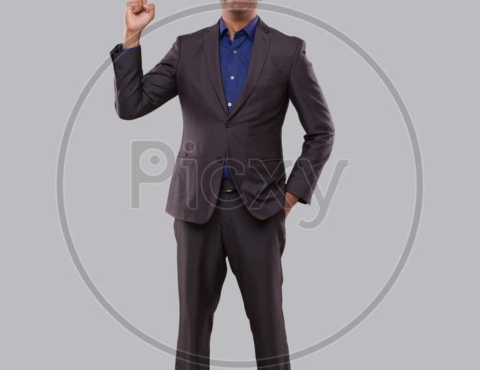 Businessman Poiting Up Watching In Camera Isolated. Indian Man Standing Full Lenght
