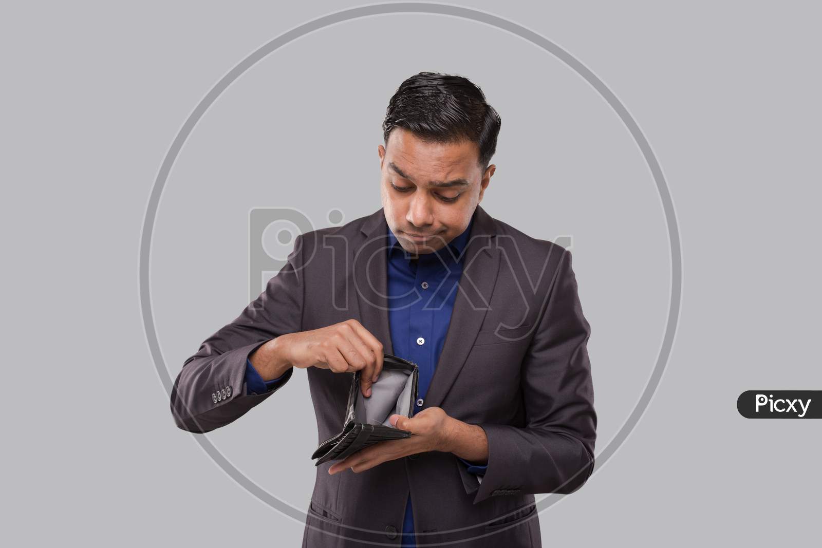 Businessman Holding Empty Wallet. Indian Business Man No Money, No Salary, No Cash Concept