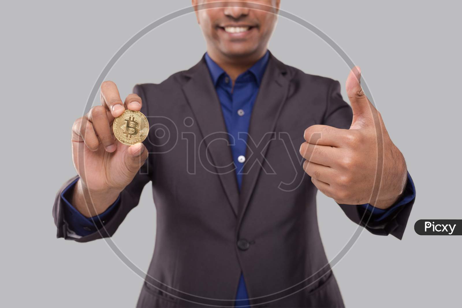 Businessman Showing Bitcoin And Thumb Up. Business Man Cypto Currency.