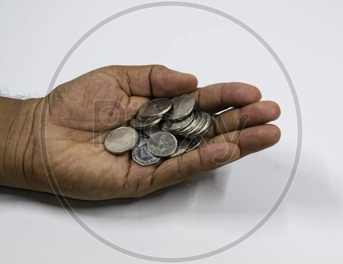 A Man Hand With Full Of Uae Coins With White Background, Fils,