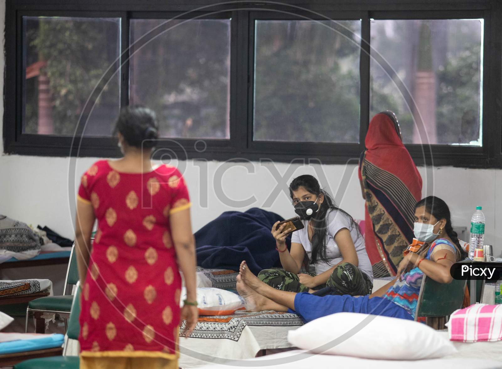 Covid-19 positive patients at an isolation ward at the Common Wealth Games stadium which has been converted into a Coronavirus Care Centre in New Delhi on July 17, 2020