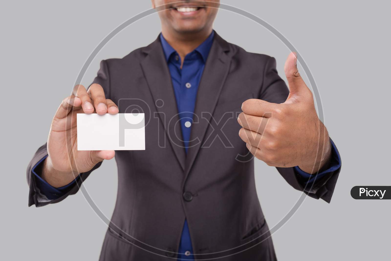 Businessman Showing Visit Card And Thumb Up Isolated Close Up. Indian Business Man Blank Card In Hand