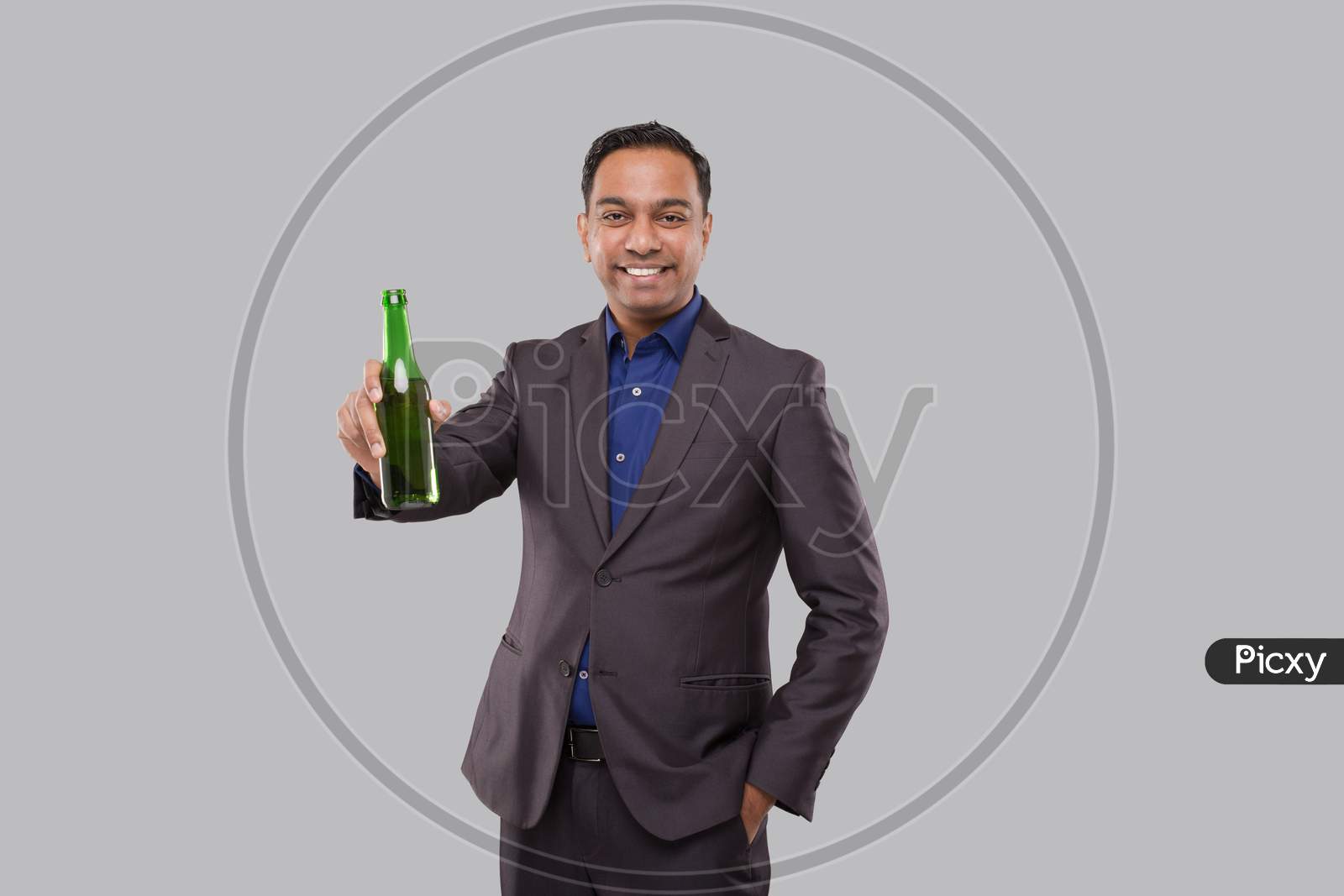 Businessman Holding Beer Bottle. Indian Business Man With Beer Bottle In Hand.
