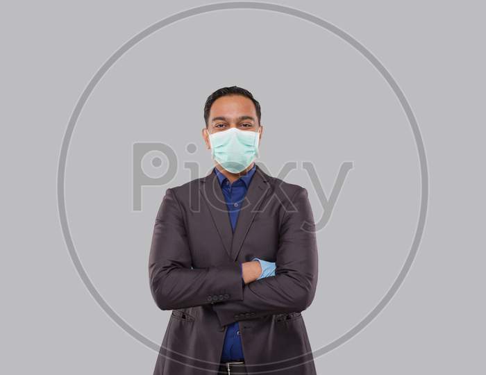 Businessman Smilling Hands Crossed Wearing Medical Mask And Gloves Isolated. Indian Business Man Standing Health Protection