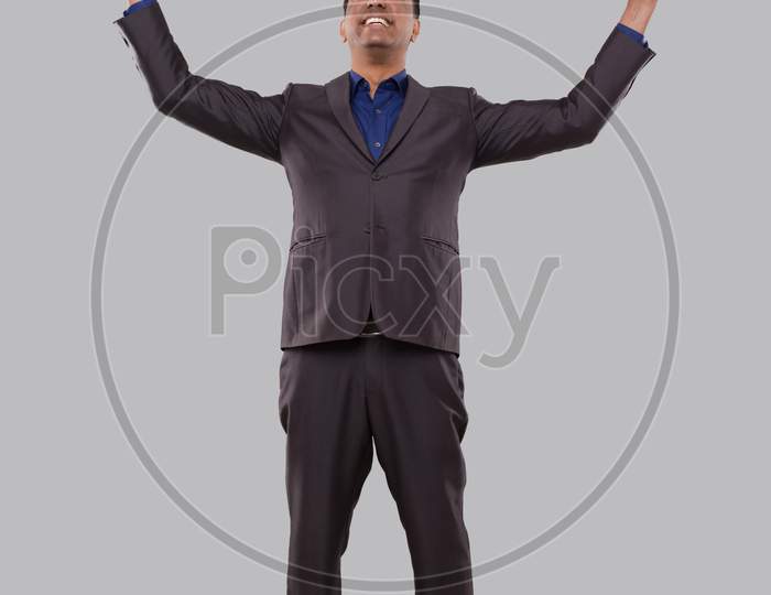 Businessman Very Happy And Excited, Raising Arms, Celebrating A Victory Or Success. Winner Sign. Indian Business Man Isolated