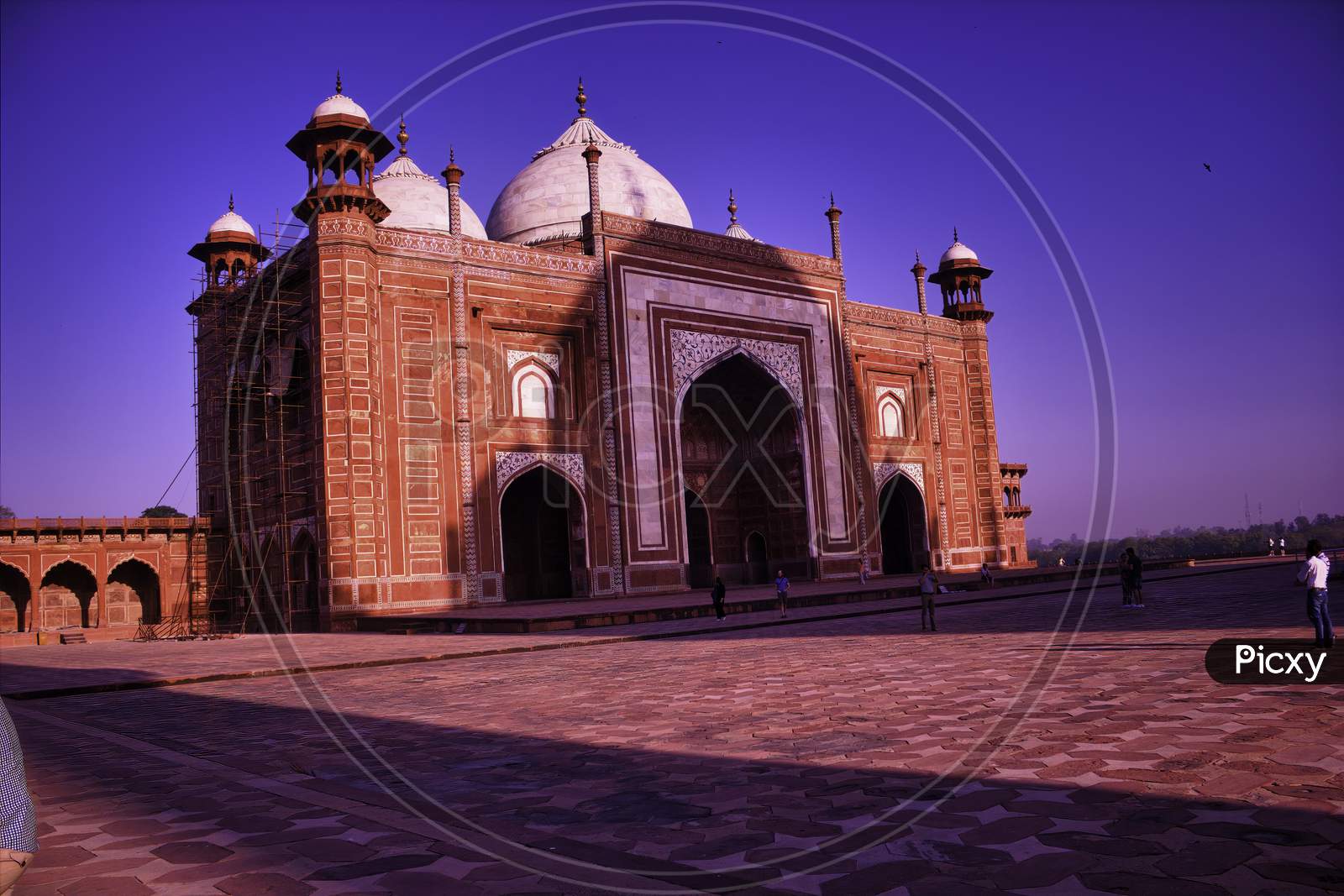 Agra, India - April 10,2014: Entrance Gate Made Of Red Stone Brick Of Tajmahal And It'S Shadow On It In Daytime