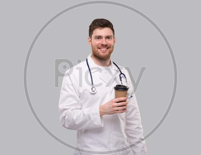Doctor Holding Coffe Take Away Cup Smiling Isolated