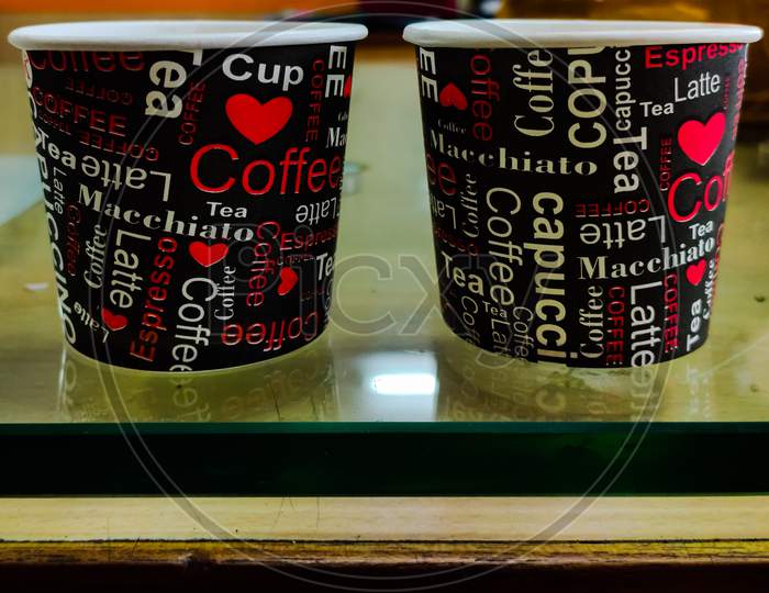 Coffee cups for two with words written on them