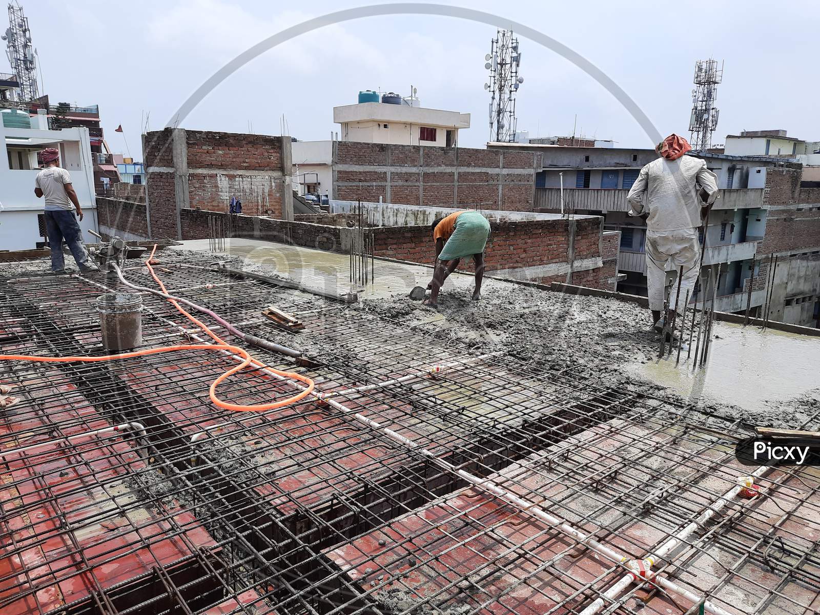 Construction worker making reinforced concrete roof
