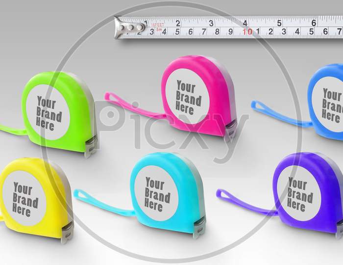Length Measuring Industrial Tapes Isolated In White With Multiple Colors
