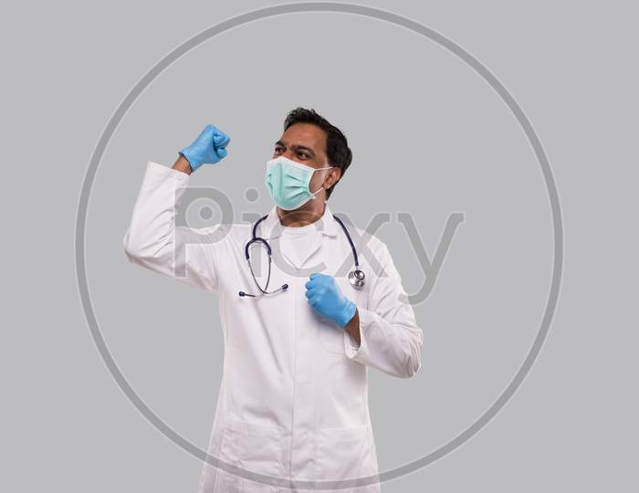 Doctor Excited Celebrating Success Wearing Medical Mask And Gloves Isolated. Indian Man Doctor Happy