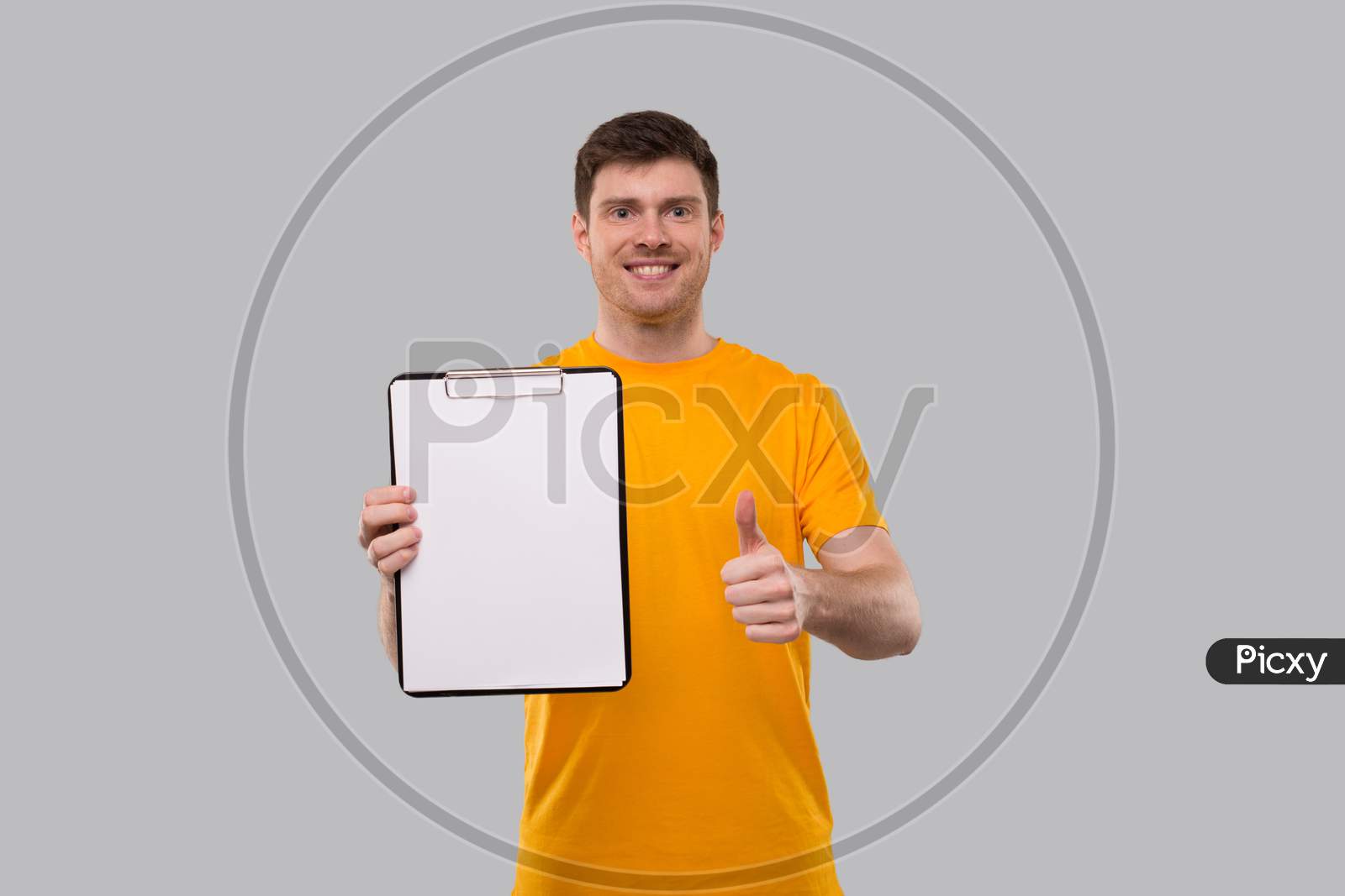 Man Thumb Up With Clipboard. Blank Clipboard In Hands