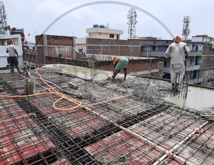 Construction worker making reinforced concrete roof