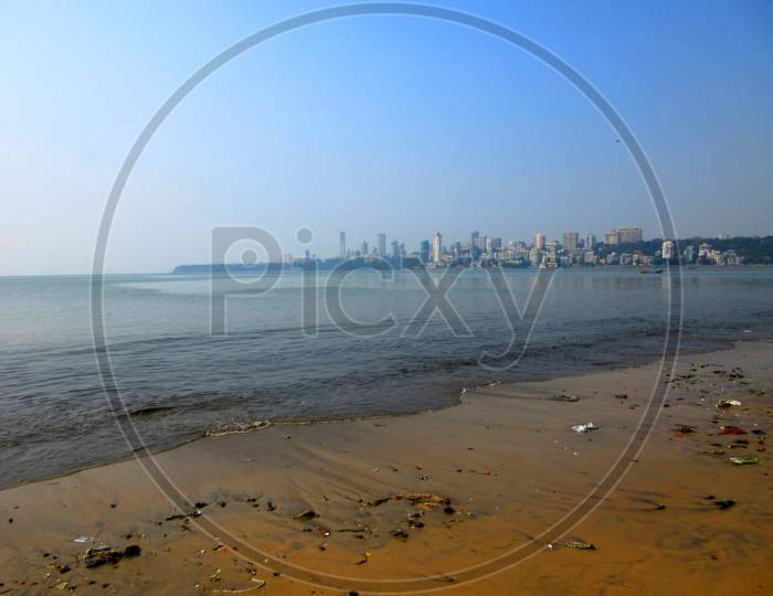 Small Polluted Beach At Mumbai Marine Drive
