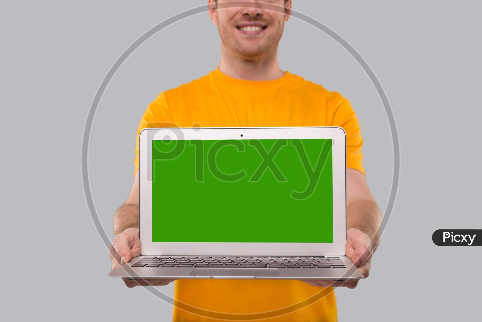 Man Showing Laptop Green Screen. Home Orders, Quarantine Delivery, Shopping Online, Freelance Worker Concept. Close Up