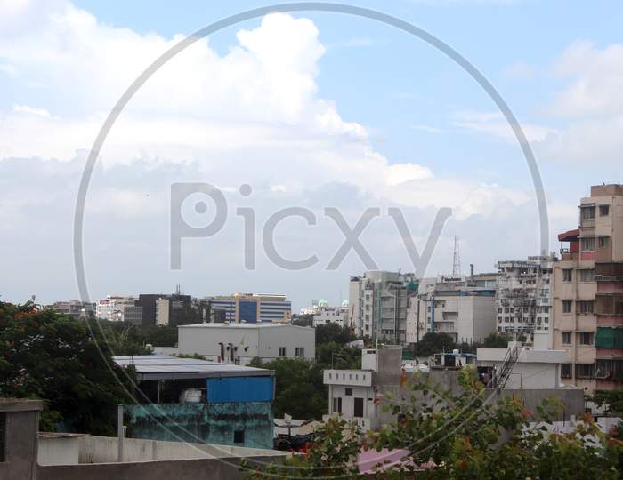 Residential Buildings And Houses In City Background