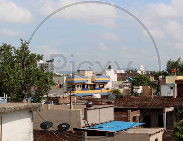 Residential Buildings And Houses In City Background