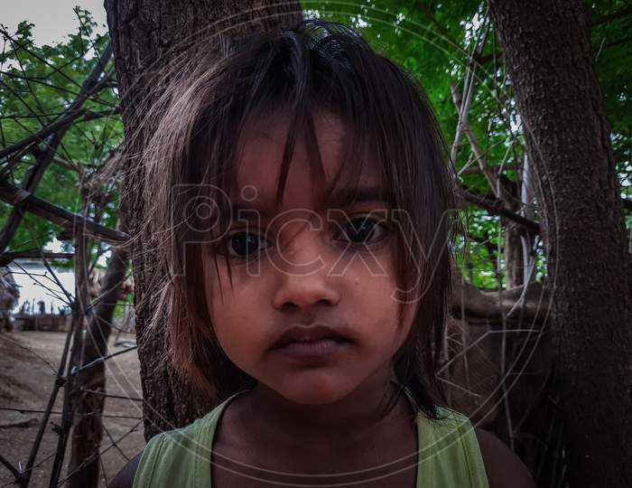 Portrait of Indian Village Poor Girl.