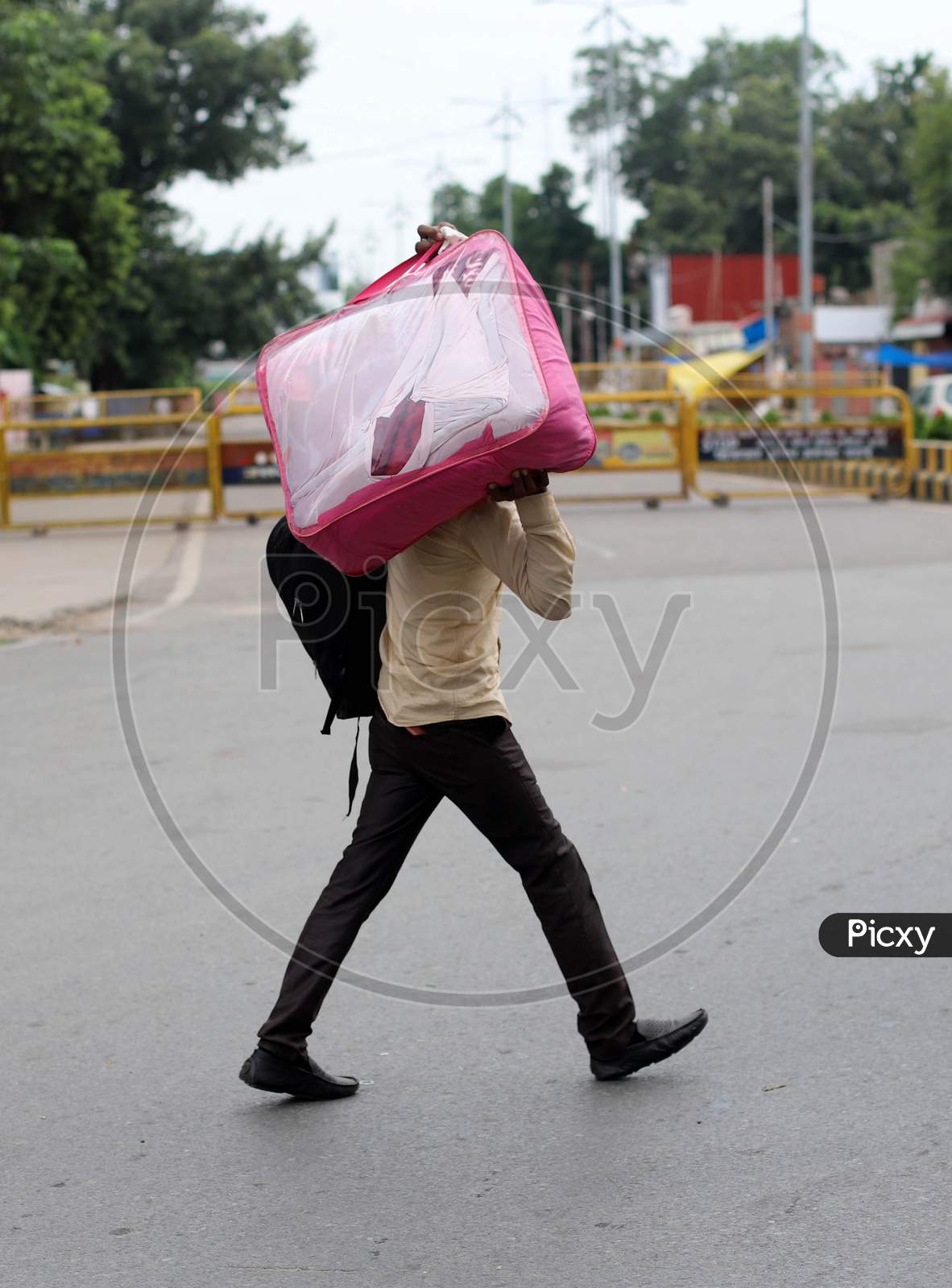 A Man Walks On The Empty Road during Total Lockdown Imposed By Uttar Pradesh Government Due To Surge In Covid-19 Cases In Prayagraj, July 19, 2020.