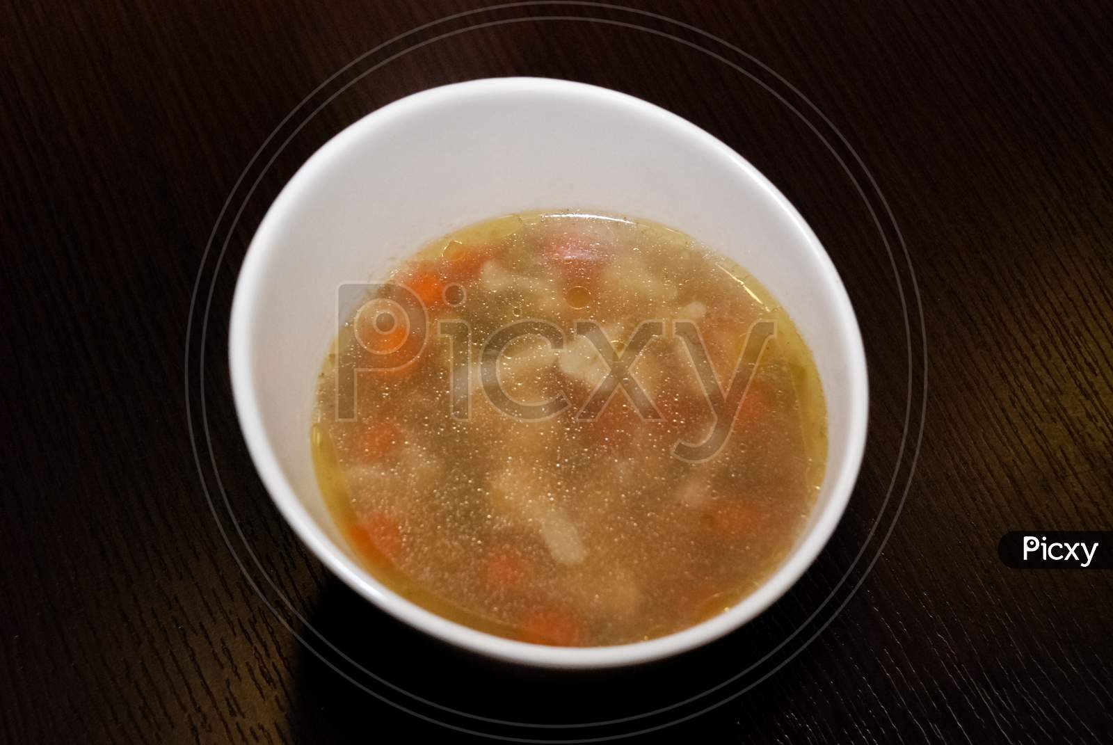 Vegetable Soup Served In The White Bowl