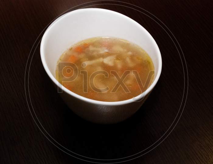 Vegetable Soup Served In The White Bowl