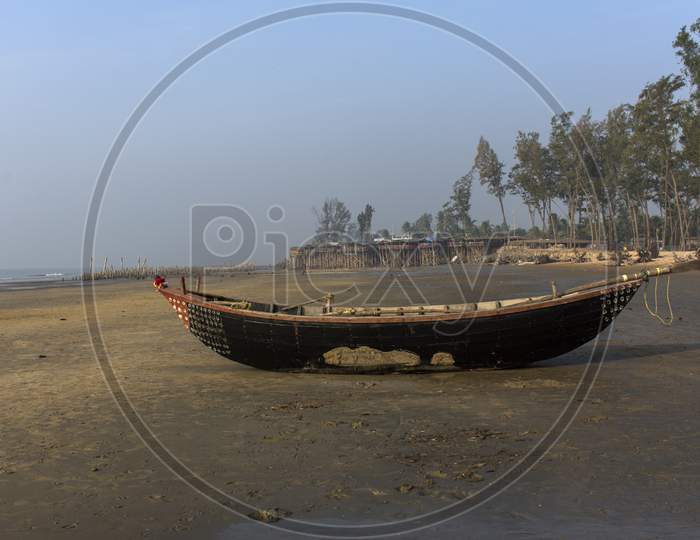 A Fishing Boat On A Sea Beach