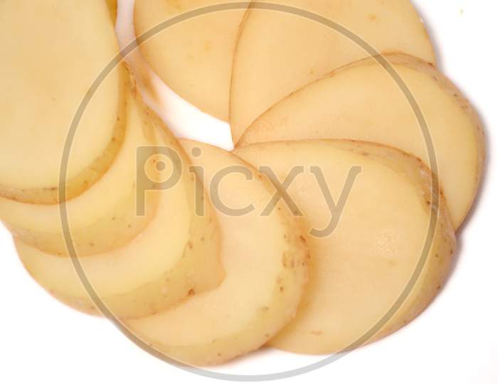 sliced potato isolated on white background.