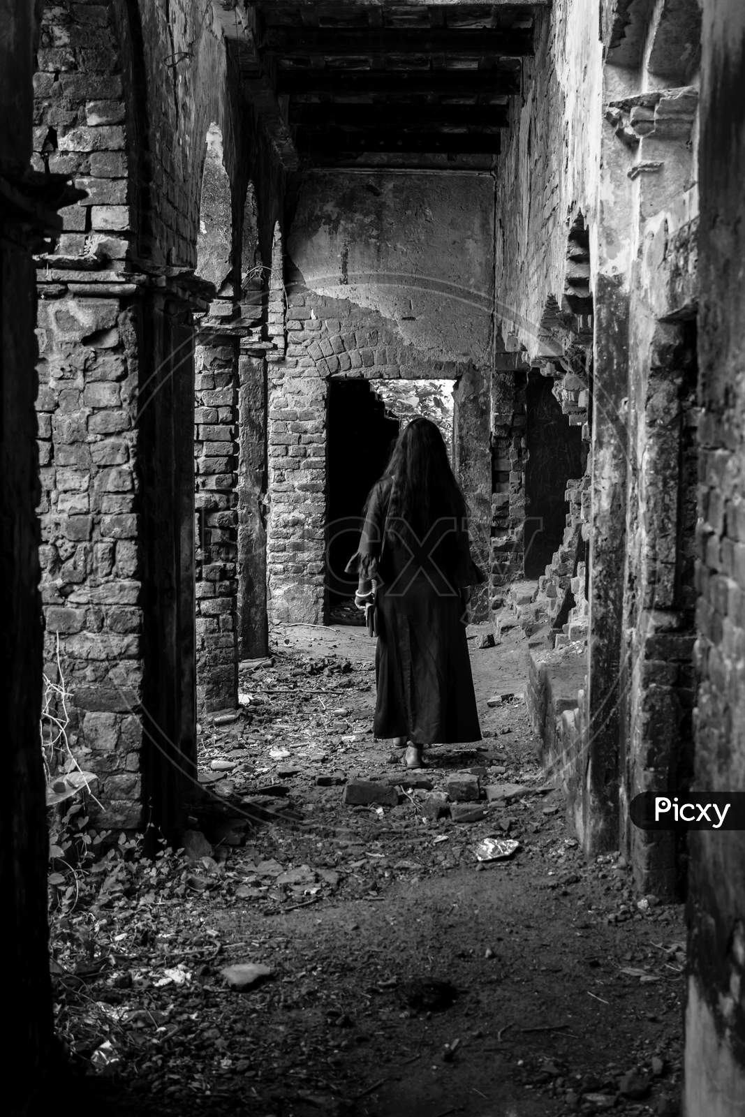Isolated Lady Standing Inside A Haunted Old Abandoned House