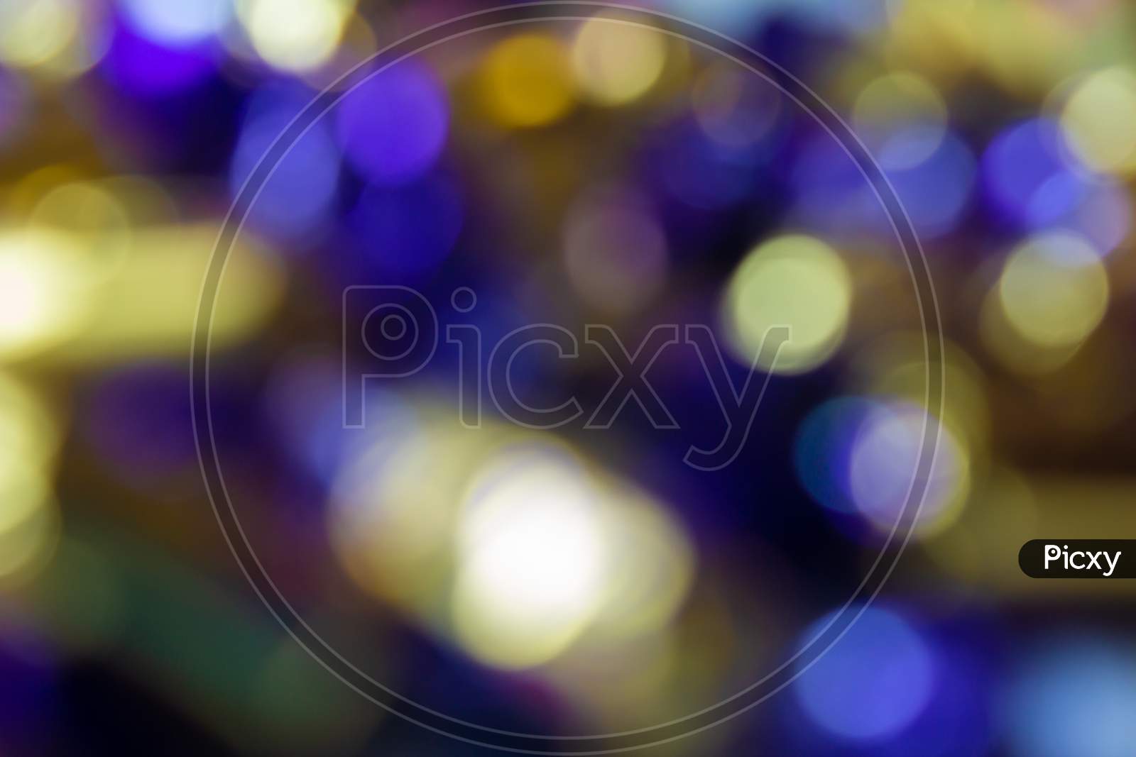 Beautiful Background With Round Bokeh Effects Of Light.