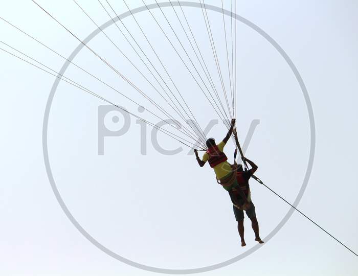 enjoying parasailing at Baga Beach Goa