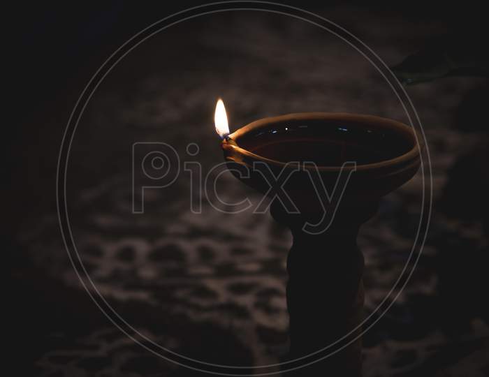 diya oil lamp in the dark night