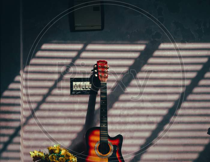Guitar,light and shadow
