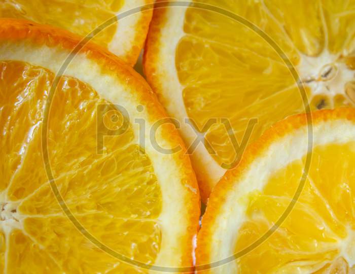 Top View Of Sliced Oranges Which Is Good In Vitamin C. Immunity Boosting Food.